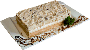 BIAŁY LEW - Jasny biszkopt z kremem śmietankowo-karmelowym posypany ryżem preparowanym.