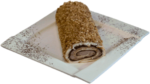 ROLADA ORZECHOWA - Zrolowany jasny biszkopt z nadzieniem orzechowym obsypany orzechami.