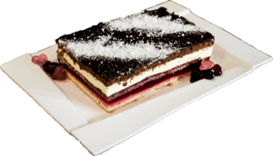 ZOŚKA - Ciasto piaskowe czekoladowe i ciasto z makiem przełożone galaretką wiśniową z pianką cytrynową przykryte czekoladowym ciastem oraz polane czekoladą.